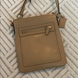 Tan leather Coach cross body.